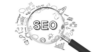 seo spelt out in magnifying glass with little animations around