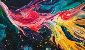 abstract swirl art image with deep red, blue, yellow, and white colors intermixed