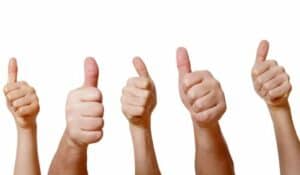 row of hands with thumbs up