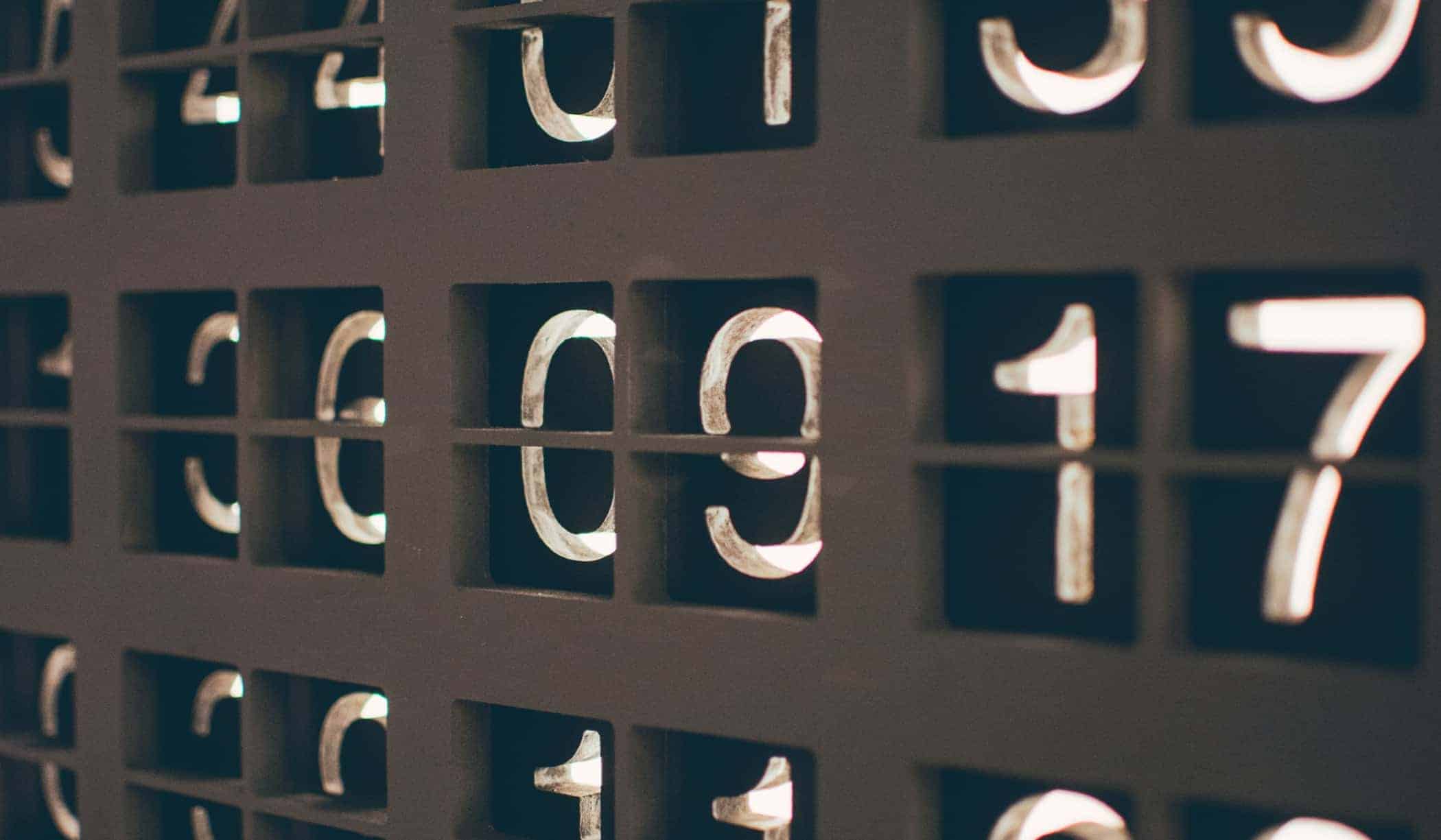 close up of a black and white board with flip numbers