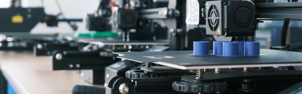 Close up of 3-D printer printing material