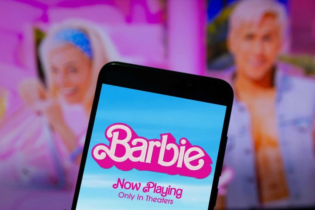 The Barbie logo displayed on a smartphone.