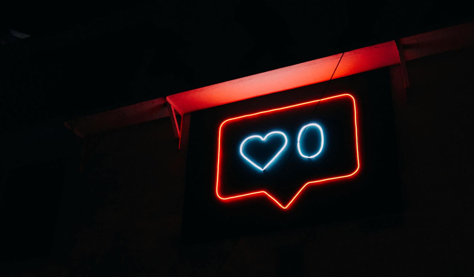 Illuminated message sign with a heart in the middle