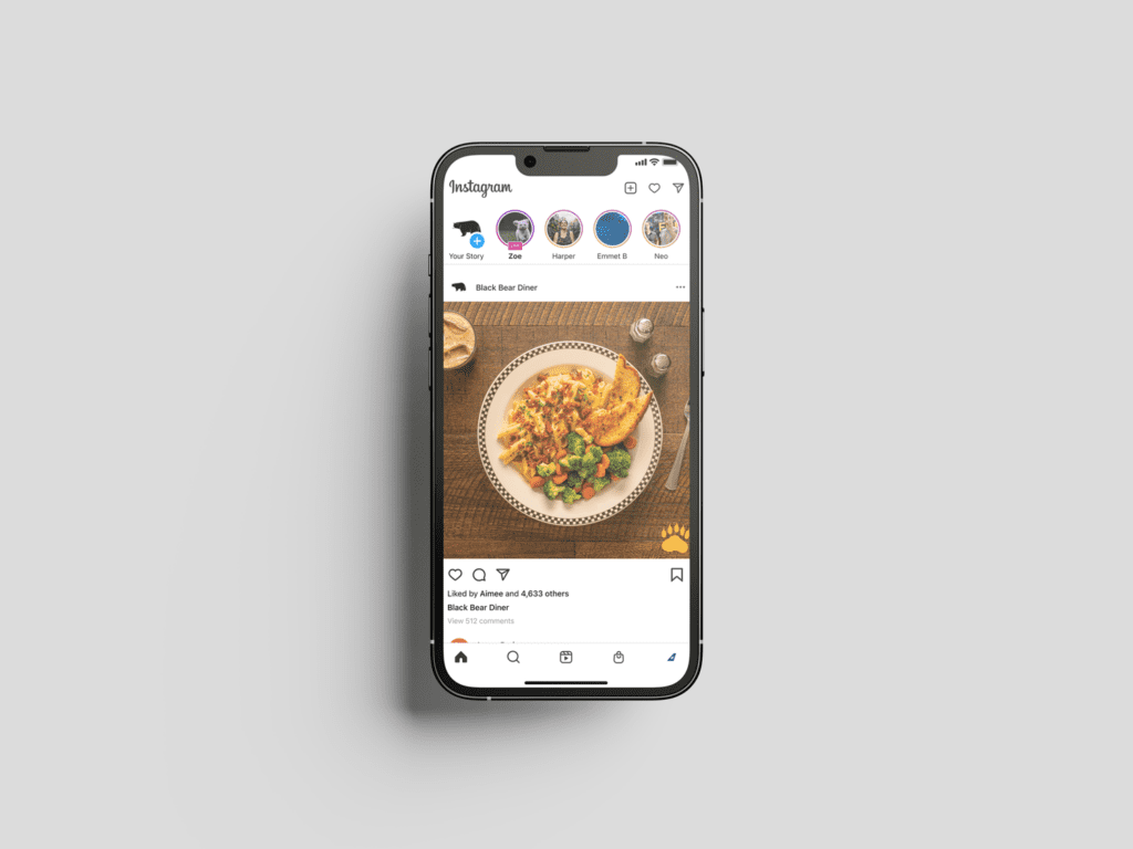 Mobile phone showing a restaurant social media post