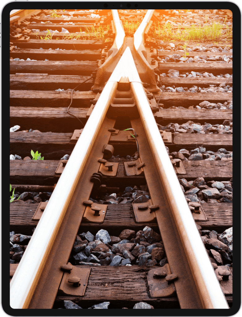 iPad Pro screen featuring a split in two railroad tracks