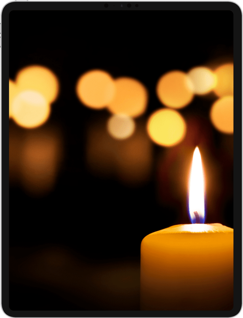 iPad Pro screen featuring image of a candle in the dark