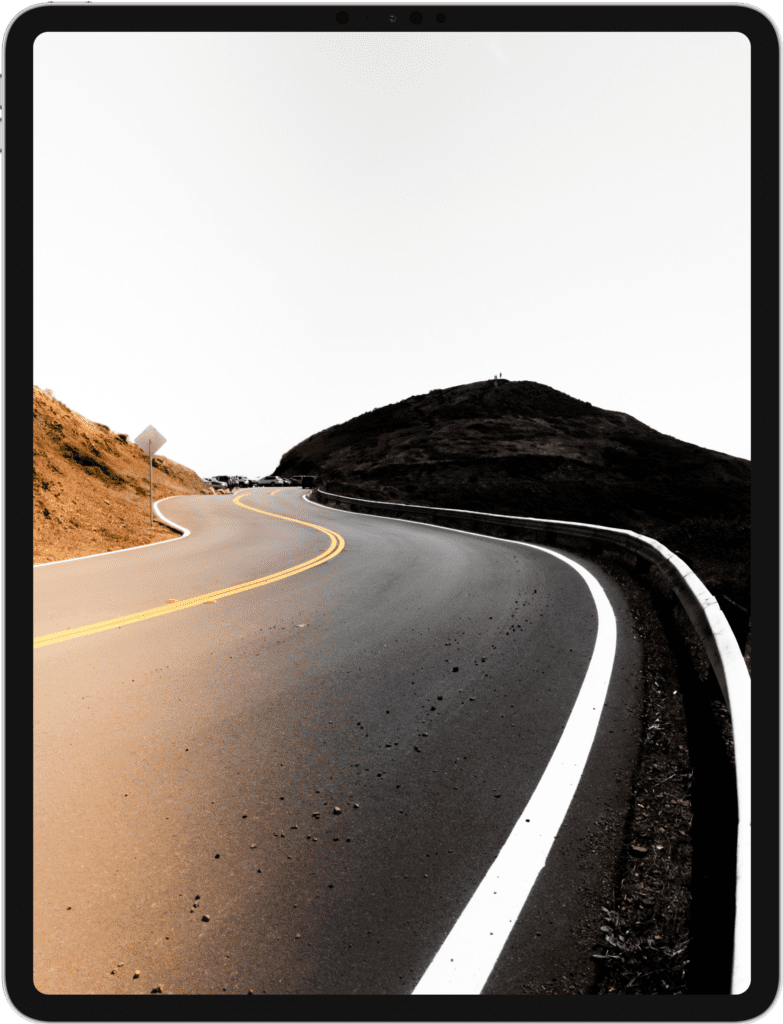 iPad Pro screen featuring a winding paved road