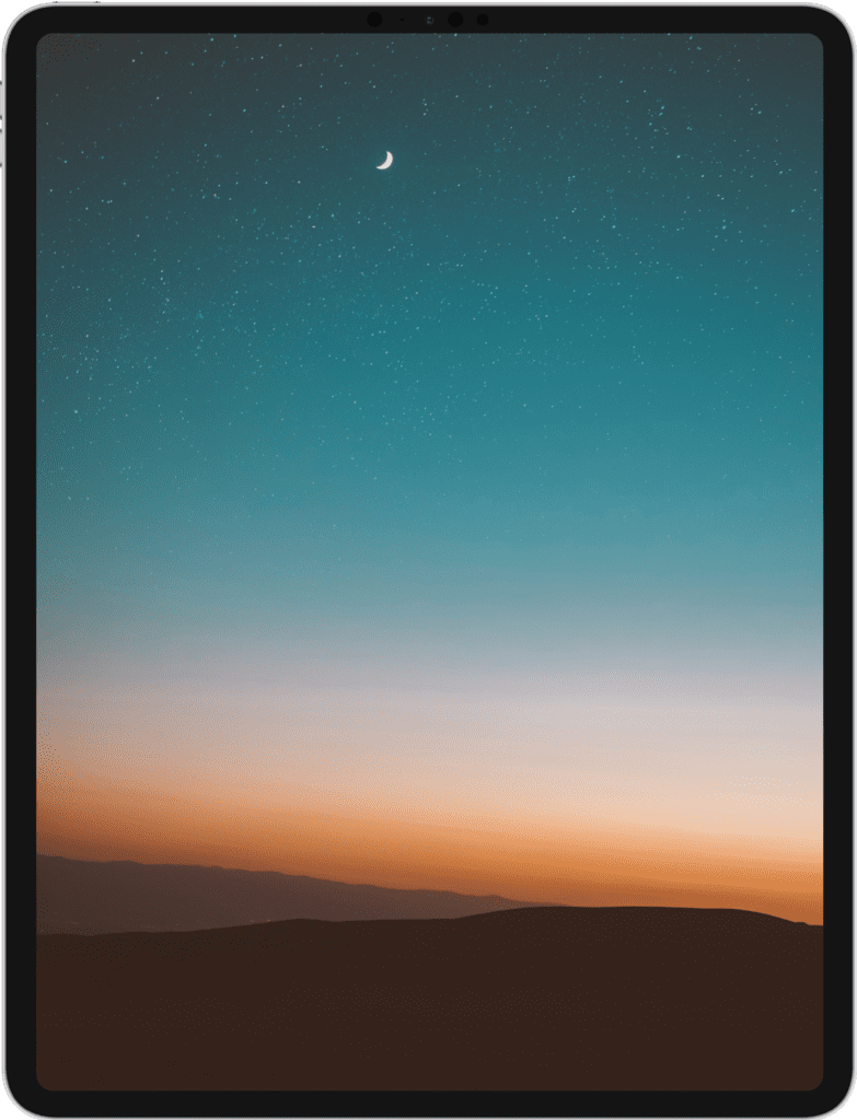 iPad featuring the night sky above a desert
